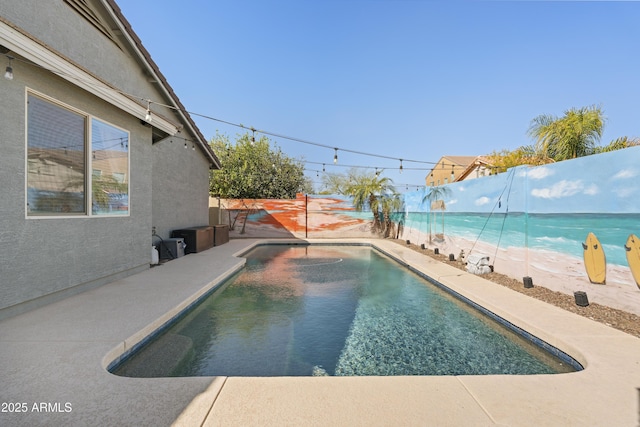 view of swimming pool featuring a fenced backyard and a fenced in pool