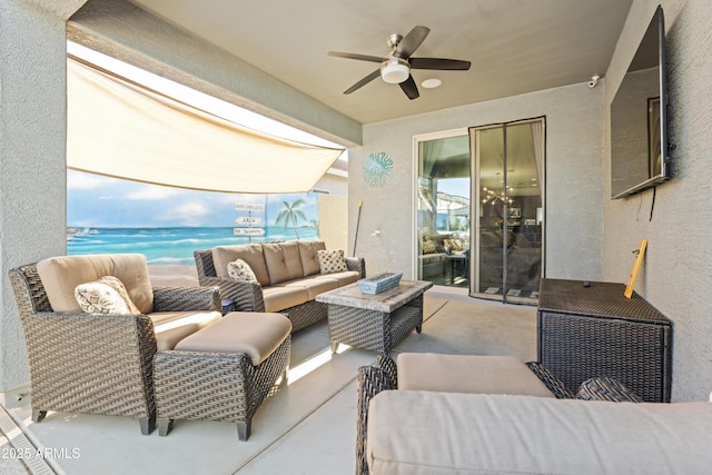 view of patio / terrace with ceiling fan and outdoor lounge area