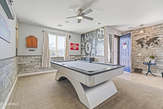 rec room featuring a ceiling fan, wainscoting, visible vents, and carpet flooring