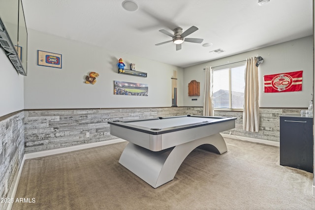 playroom featuring carpet floors, a wainscoted wall, and visible vents