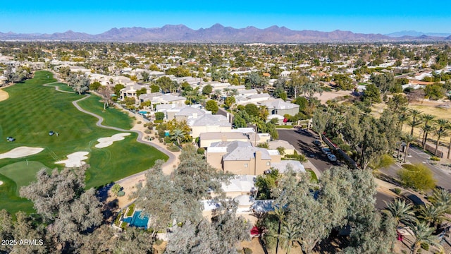 birds eye view of property featuring a mountain view