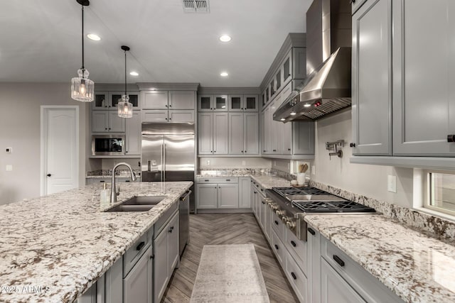 5328 S Wesley Cir, Mesa, AZ 85212 - kitchen with a sink, wall chimney range hood, stainless steel appliances, gray cabinetry, and recessed lighting