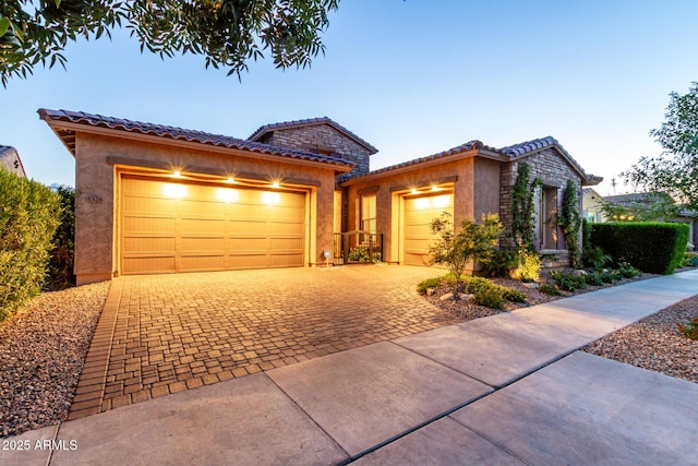 5328 S Wesley Cir, Mesa, AZ 85212 - view of front of home with a garage, stucco siding, driveway, and a tiled roof