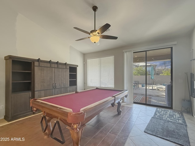 rec room with lofted ceiling, tile patterned flooring, billiards, and ceiling fan