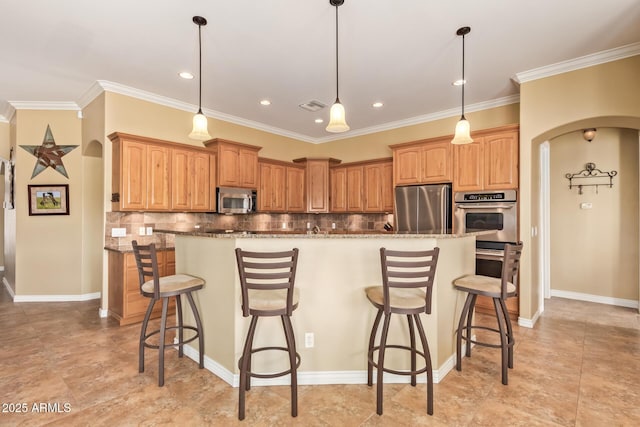 kitchen with arched walkways, stainless steel appliances, tasteful backsplash, and visible vents