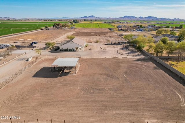 birds eye view of property with a rural view and a mountain view