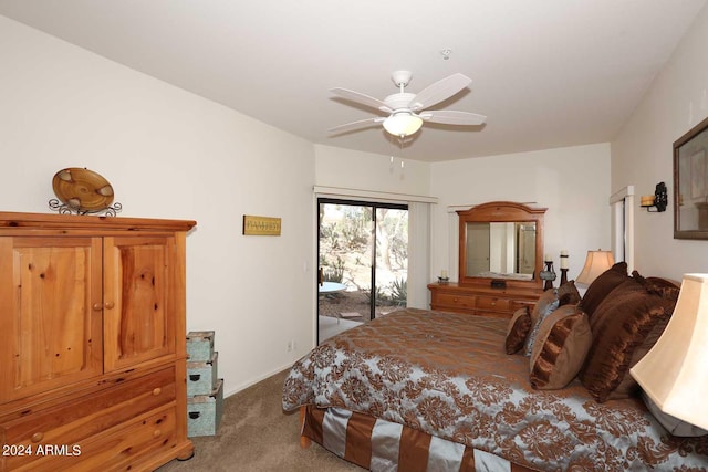 carpeted bedroom featuring ceiling fan and access to outside