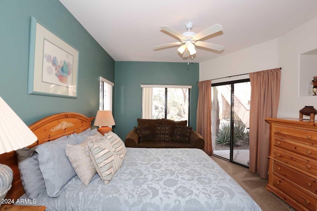 bedroom featuring light carpet, ceiling fan, and access to outside