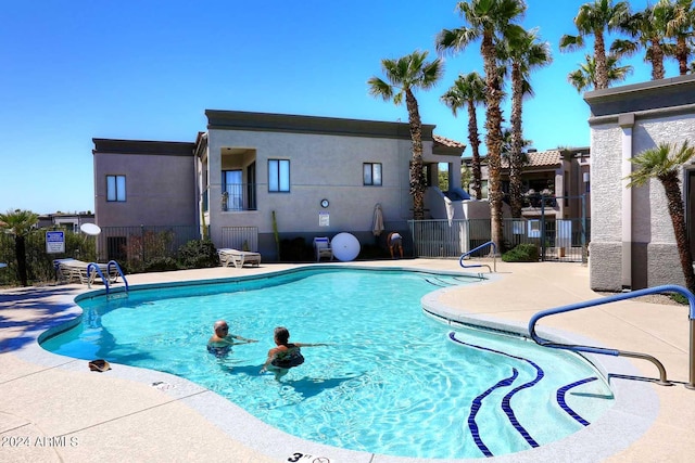 view of pool featuring a patio