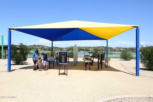 view of playground featuring a water view