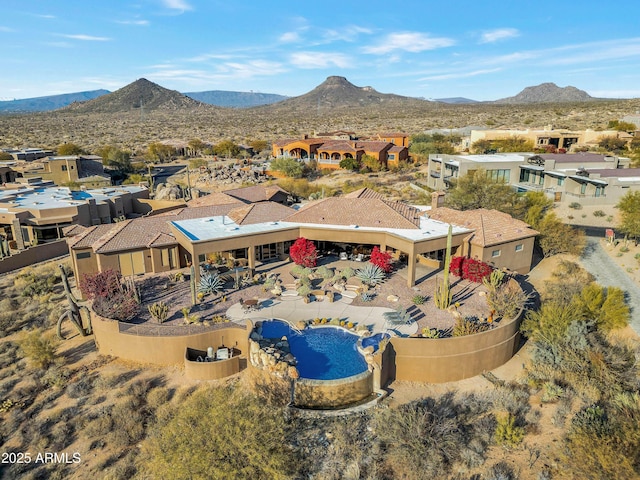 bird's eye view with a mountain view