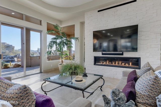 living room featuring a fireplace