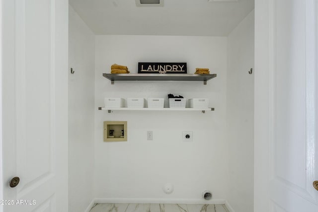 laundry room with gas dryer hookup, hookup for a washing machine, and hookup for an electric dryer