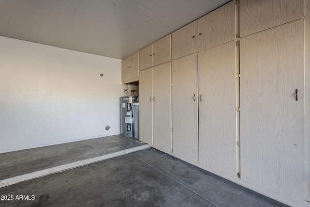 garage featuring water heater