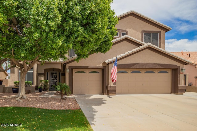 6862 W Honeysuckle Dr, Peoria, AZ 85383 - view of front facade with stucco siding, a tiled roof, an attached garage, and concrete driveway