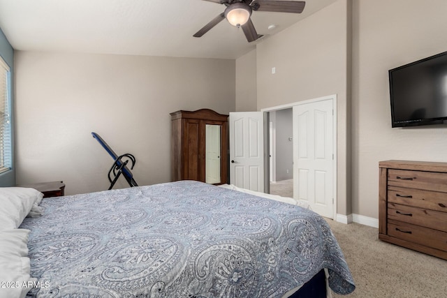 6862 W Honeysuckle Dr, Peoria, AZ 85383 - bedroom featuring light colored carpet, ceiling fan, baseboards, and high vaulted ceiling