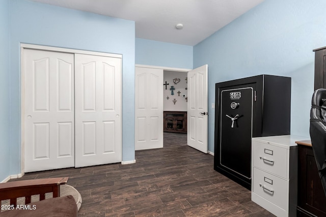 6862 W Honeysuckle Dr, Peoria, AZ 85383 - bedroom with dark wood-style floors, a closet, and baseboards