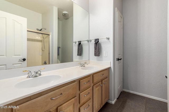 6862 W Honeysuckle Dr, Peoria, AZ 85383 - full bathroom with double vanity, tile patterned floors, a shower, and baseboards