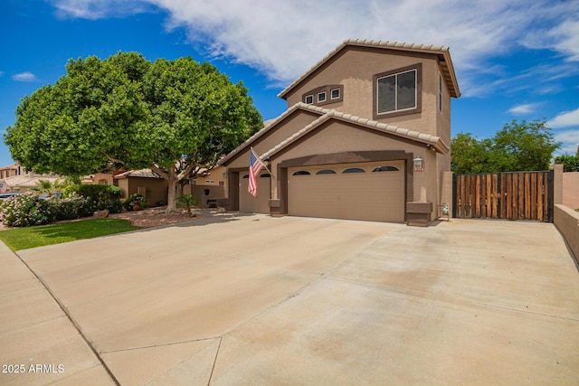 6862 W Honeysuckle Dr, Peoria, AZ 85383 - view of front of home with a tile roof, stucco siding, and concrete driveway