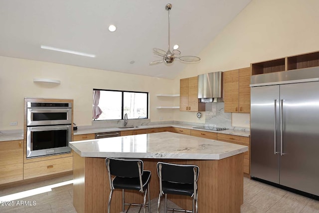 kitchen featuring open shelves, stainless steel appliances, a kitchen island, a sink, and a kitchen breakfast bar