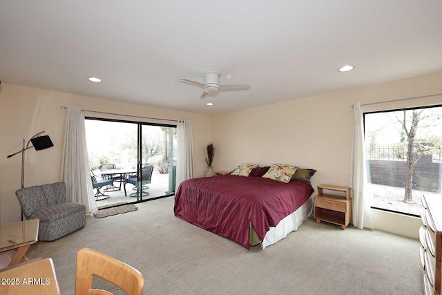 carpeted bedroom with access to outside, a ceiling fan, and recessed lighting