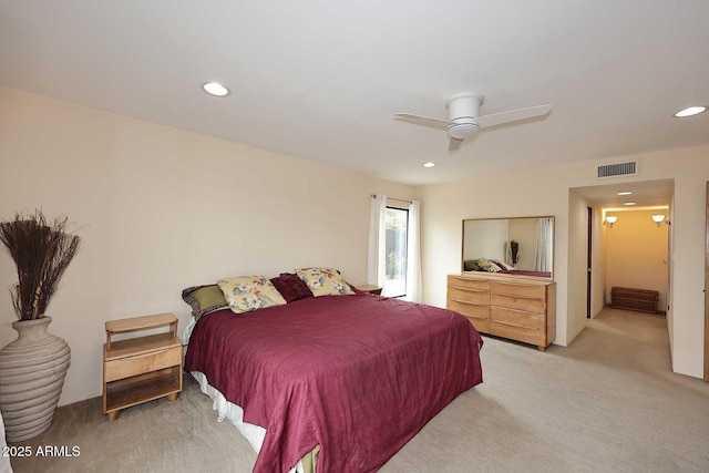 bedroom with a ceiling fan, recessed lighting, visible vents, and light carpet