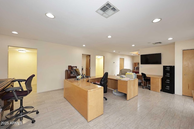 office area featuring recessed lighting and visible vents