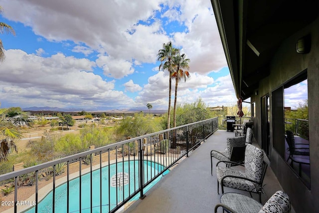 balcony featuring a mountain view