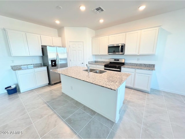 kitchen featuring white cabinetry, stainless steel appliances, and sink