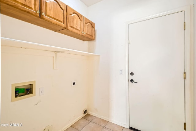 laundry room featuring light tile patterned floors, cabinet space, washer hookup, and electric dryer hookup