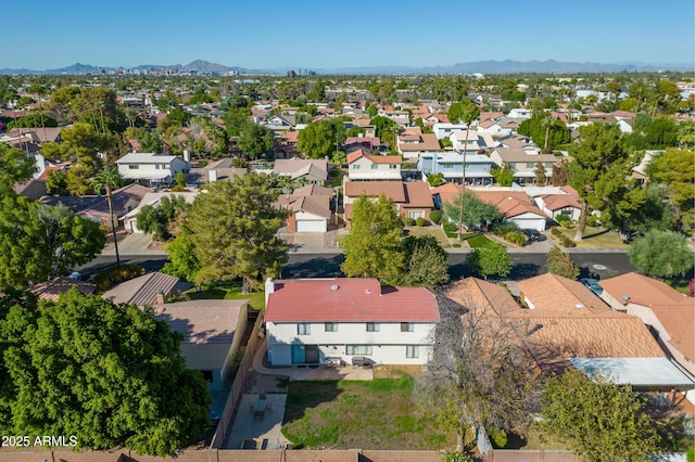 bird's eye view featuring a mountain view and a residential view