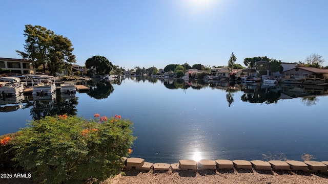 view of water feature with a dock