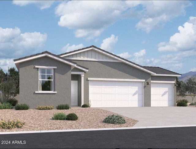 single story home featuring a garage, driveway, and stucco siding