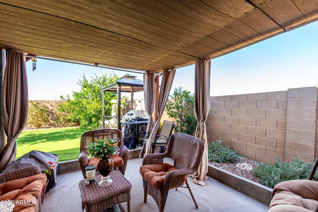 view of patio / terrace with fence