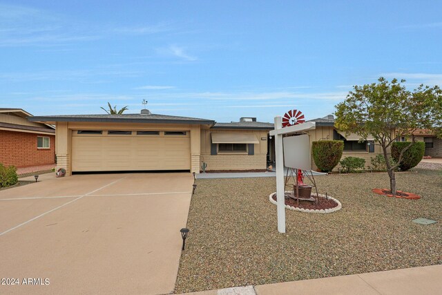 ranch-style house with a garage