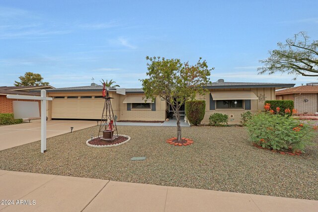 ranch-style house with a garage