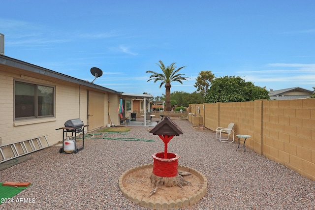 view of yard featuring a fenced backyard and a patio