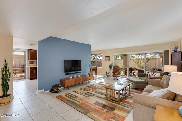 living room with light tile patterned flooring