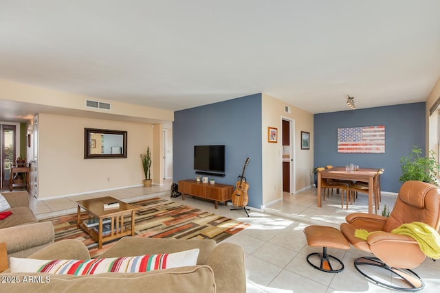 living room featuring light tile patterned floors