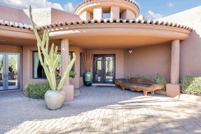 doorway to property with french doors