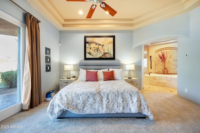 carpeted bedroom with ceiling fan, access to exterior, and multiple windows