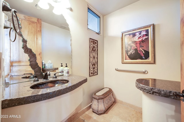 bathroom featuring tile patterned floors and sink