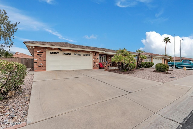 single story home featuring a garage