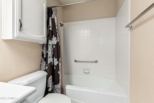 bathroom featuring shower / bathtub combination with curtain and toilet