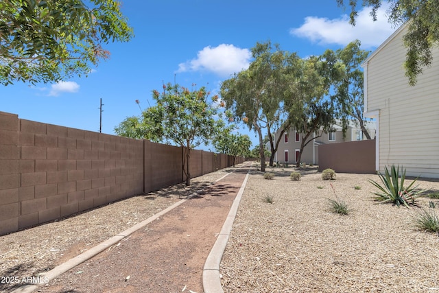 view of yard with fence