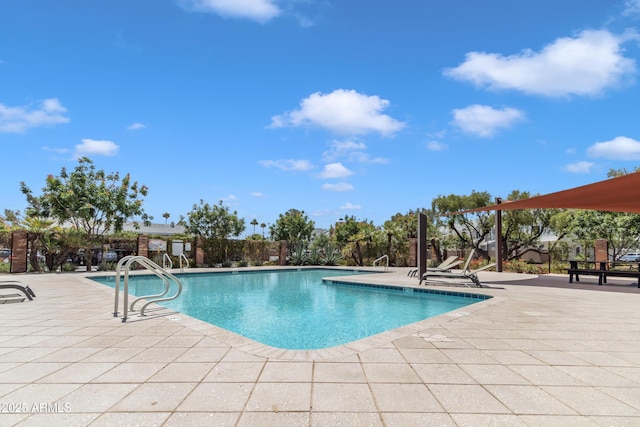community pool with a patio