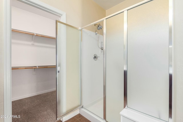 bathroom featuring walk in shower