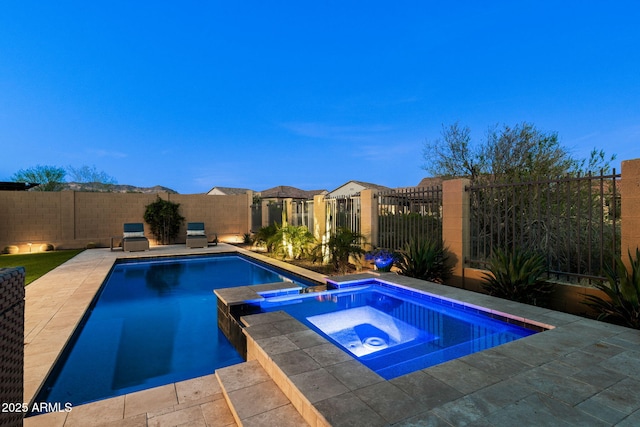 8633 E Kael Cir, Mesa, AZ 85207 - view of pool with a fenced backyard, a pool with connected hot tub, and a patio area