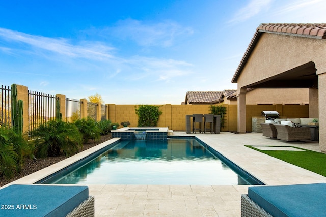 8633 E Kael Cir, Mesa, AZ 85207 - view of pool featuring outdoor lounge area, a patio area, a fenced backyard, and a pool with connected hot tub