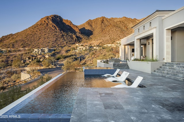 view of patio featuring a mountain view